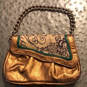 Amykathryn gold with green clutch handbag with chain and floral motif